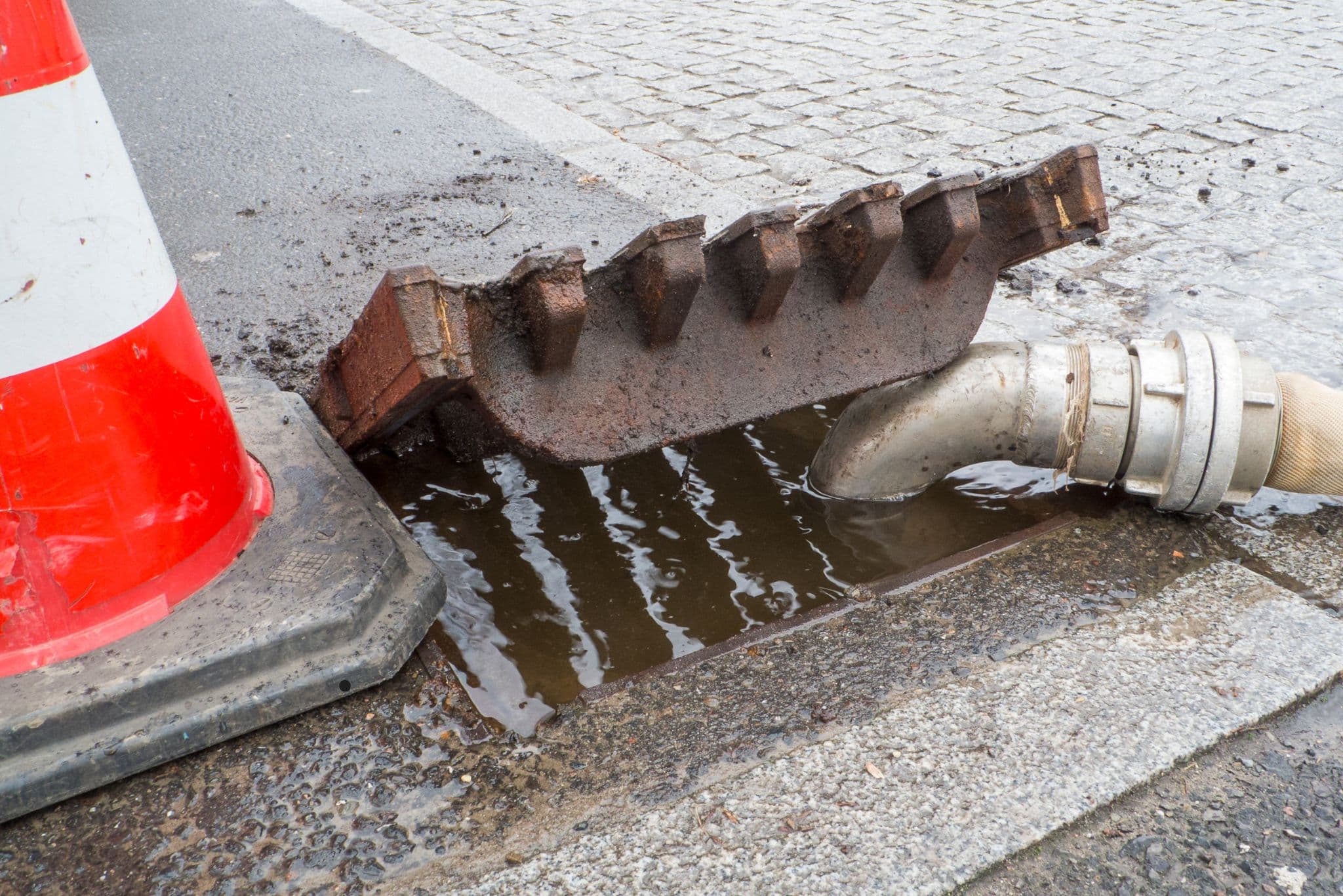 Water overflowing from a blocked outdoor drain